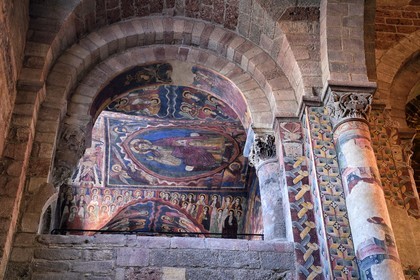 France, Haute Loire, Brioude, the Basilica of Saint-Julien de Brioude in Auvergne Romanesque style, 13th century frescoes in the Saint Michel chapel in the south gallery of the front nave, Christ in glory is surrounded by the four evangelists, angels and saints