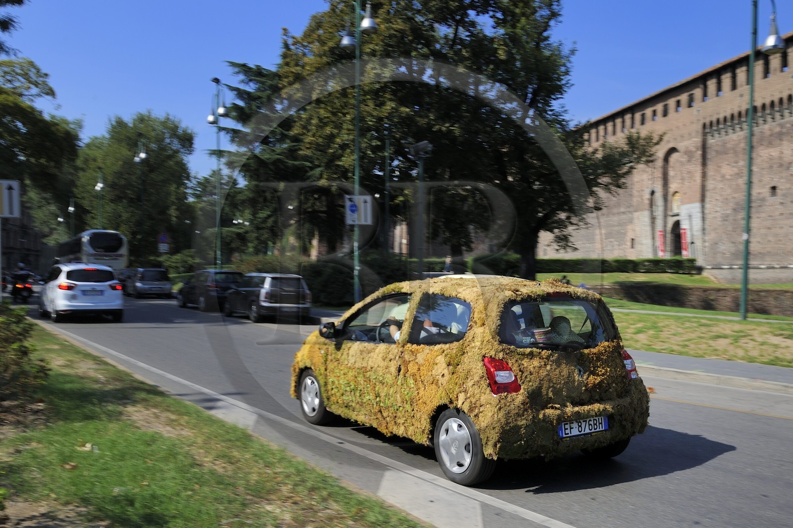 Italy, Lombardy, Milan, vegetated car (Renault Twingo)