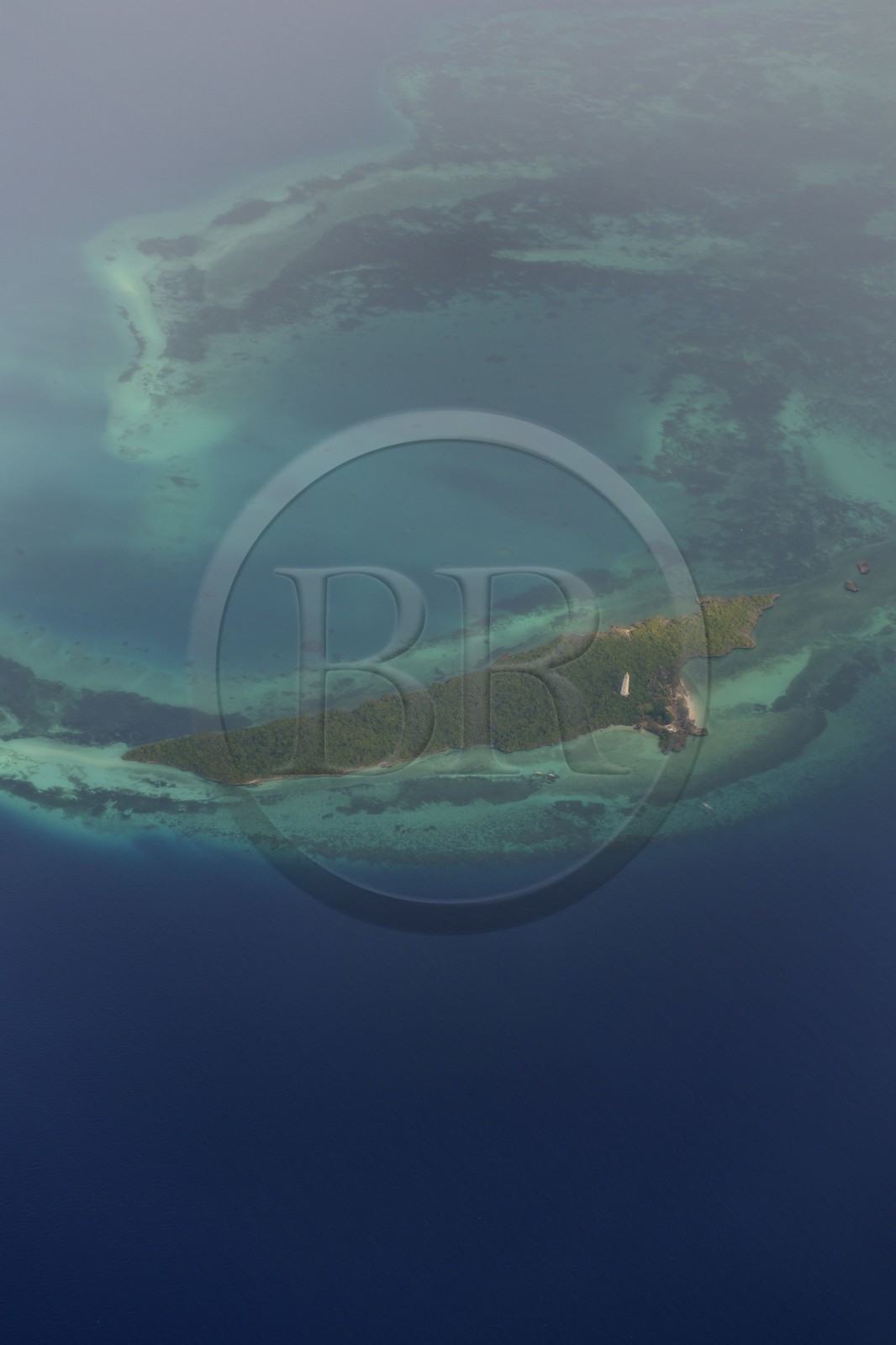 Tanzania, Zanzibar Archipelago, Unguja island (Zanzibar),  west coast, Eco-bungalows and nature reserve of  Chumbe Island Coral Park (aerial view)