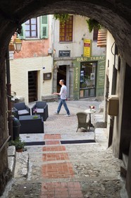 France, Alpes-Maritimes, Peille, bar-tobacco shop and restaurant at the corner of a steep street