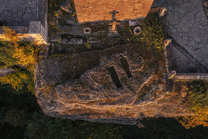 France, Bas Rhin, Mont Saint Odile, Mont Sainte-Odile Abbey also known as Hohenburg Abbey, ancient Merovingian tombs carved into the rock at the foot of the Chapel of Tears facing the plain of Alsace (aerial view)