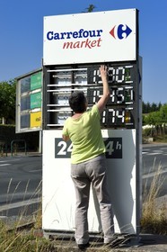 France, Dordogne, Thivier, a hypermarket petrol price indicator panel