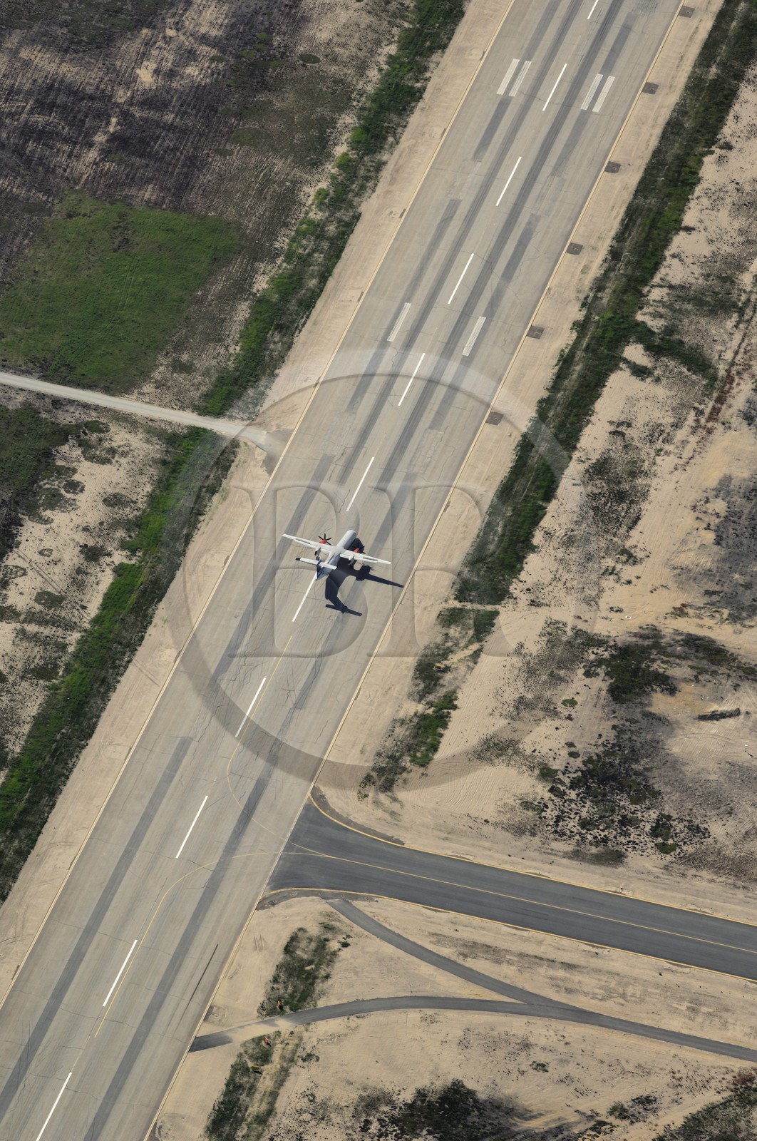 Sweden, Västernorrlands, plane taking off from the runway of Örnsköldsvik airport (aerial view)