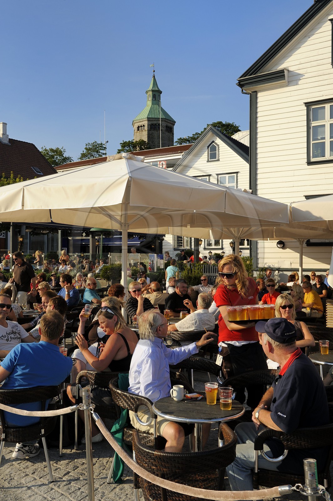 Norway, Rogaland County, Stavanger, cafe terrace in the old harbour (Vagen)