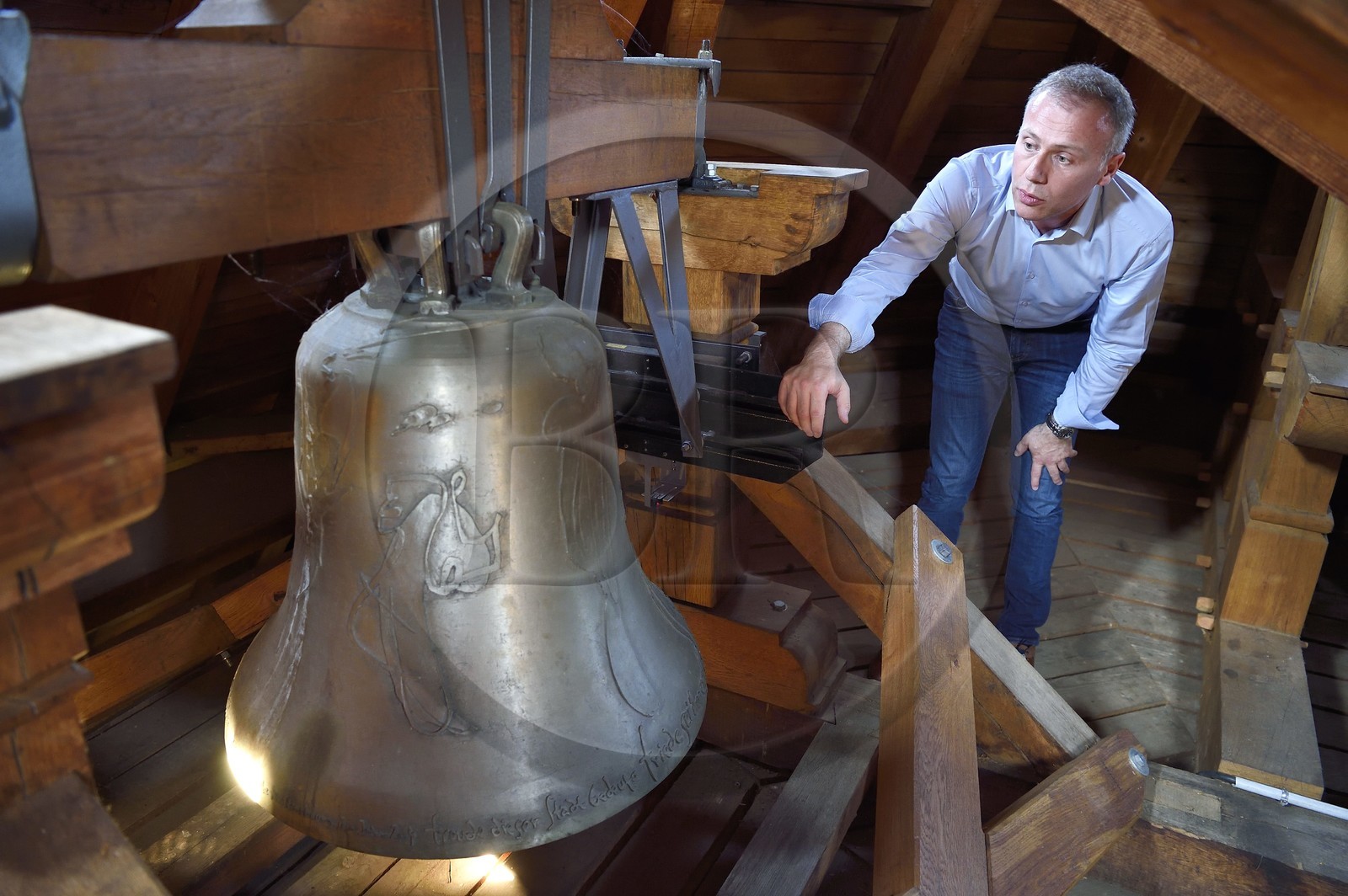 France, Bas Rhin, Strasbourg, old town listed as World Heritage by UNESCO, Notre Dame Cathedral, the campanologist of the diocese Olivier Tarozzi in the roof of the Klotz tower which includes six bells that ring the weekly masses but also the baptisms, marriages and deaths of the parishioners