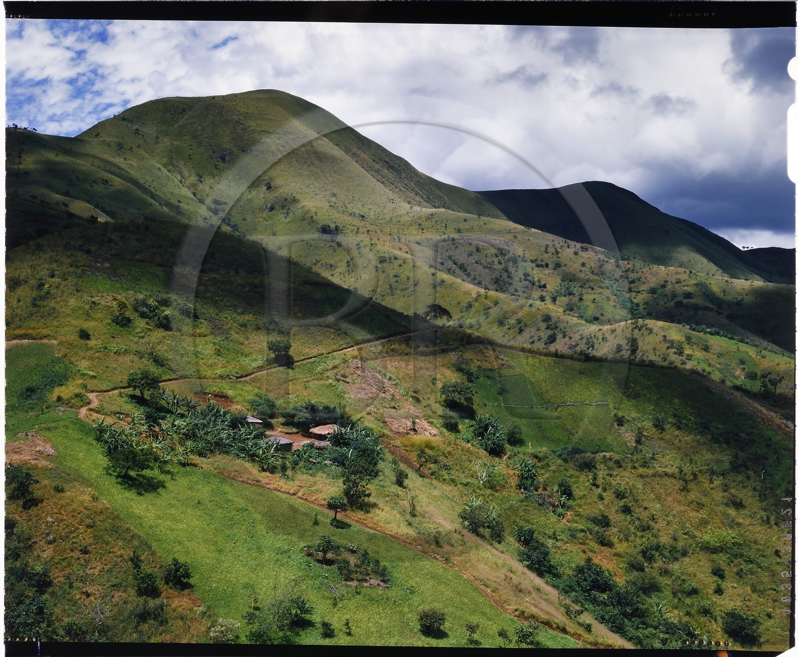 Burundi, Bujumbura Province, Ijenda area, typical landscape of mountain chain culminating at Mount Teza 2665m and boerdering Lake Tanganyika, these barren landscapes are the product of intensive deforestation due to traditional farming Burundian methods, rugo (traditional farm) (4x5 reversal film reproduction)