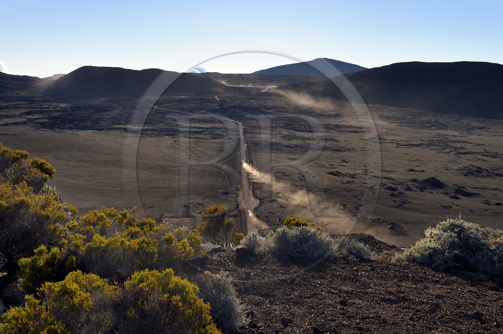 France, Reunion island (French overseas department), Reunion National Park listed as World heritage by UNESCO, on the slopes of the Piton de la Fournaise volcano, hike of the Ste Therese oratory path above the Plaine des Sables that we can see below