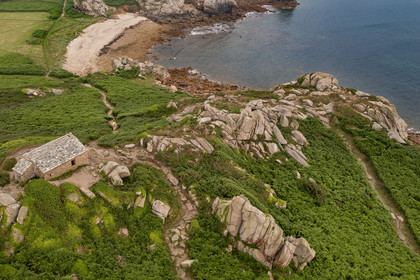France, Finistère, Plougasnou, Primel-Trégastel, Pointe de Primel at the end of Morlaix Bay and the customs officer’s house on the GR 34 hiking trail (aerial view)