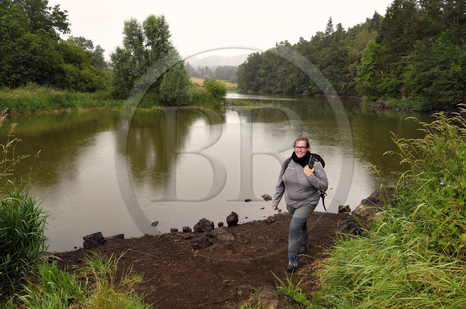 France, Puy de Dome, Aydat, towards the pond of Chateau de Montlosier, Catline Lajoie nature warden at the Parc Naturel Régional des Volcans d'Auvergne (regional nature park of Auvergne volcanoes)
