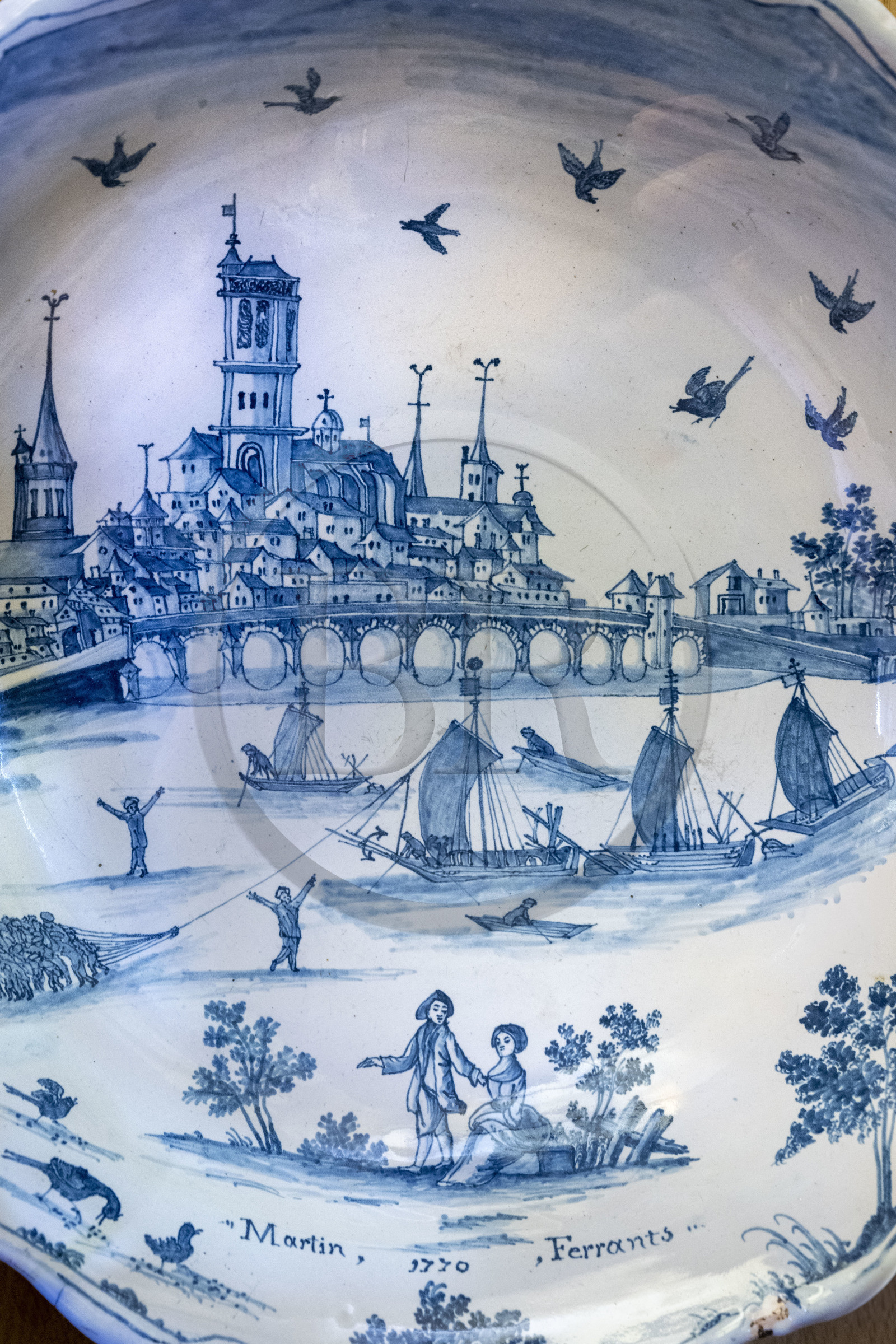 France, Nièvre, Nevers, Museum of Earthenware (musée de la Faïence) and Fine Arts, salad bowl with patronymic decoration at Pont de Loire dedicated to Martin Ferrants (1770) attributed to Claude Guillaume Bigourat