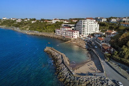 France, Pyrenees Atlantiques, Basque Country coast, Guethary, old whaling port overlooked by the former art deco Guétharia hotel built in the 1920s turned into a residence (aerial view)
