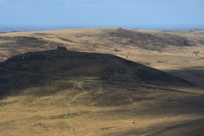 France, Finistere, Parc Naturel Regional d'Armorique (Armorica Regional Natural Park), Monts d'Arree, Brasparts, the Saint Michel chapel at the top of Menez Mikael (aerial view)