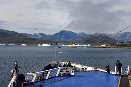 Greenland, Nanortalik Fjord, Princess Danae cruise ship moving between the icebergs