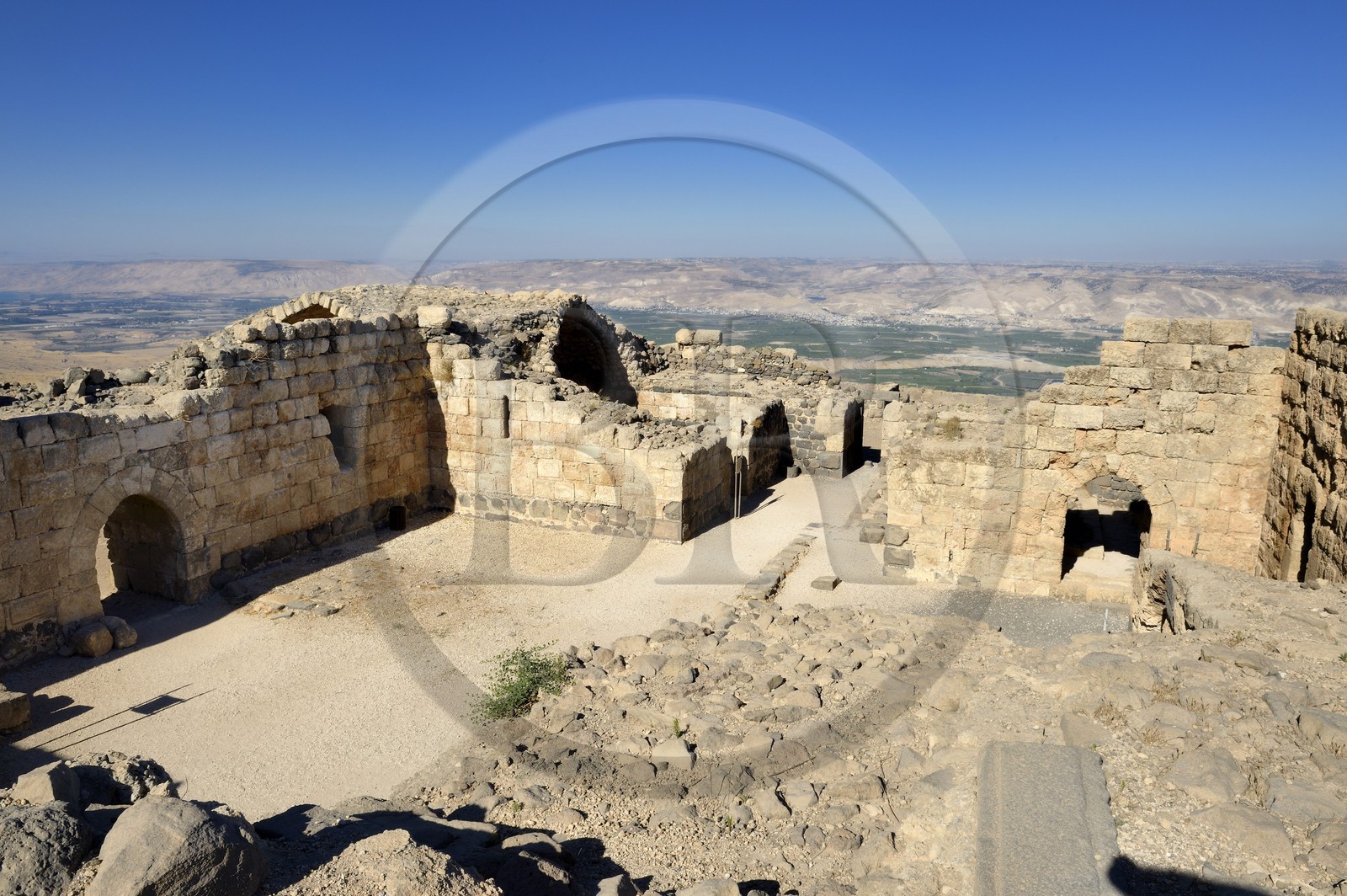 Israel, Northern District, Galilee, Belvoir Fortress is a Crusader fortress hold by the Knights Hospitaller between 1168 and 1189 overlooking the Jordan River valley, the central courtyard of the castle and the mountains of Jordan in the background
