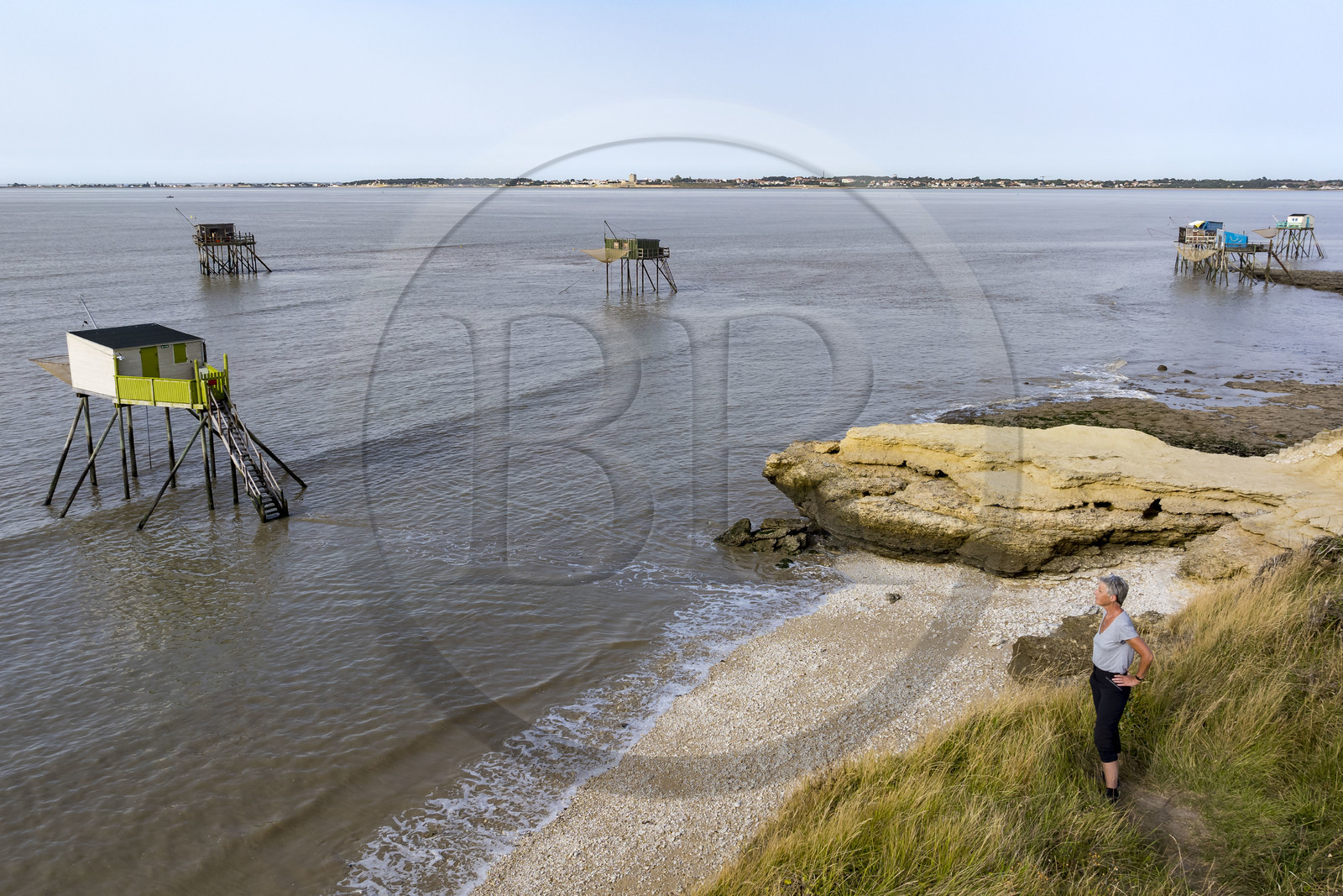 France, Charente Maritime, Port des Barques, Ile Madame, huts on stilts called carrelets and cyclist on a hike (aerial view)