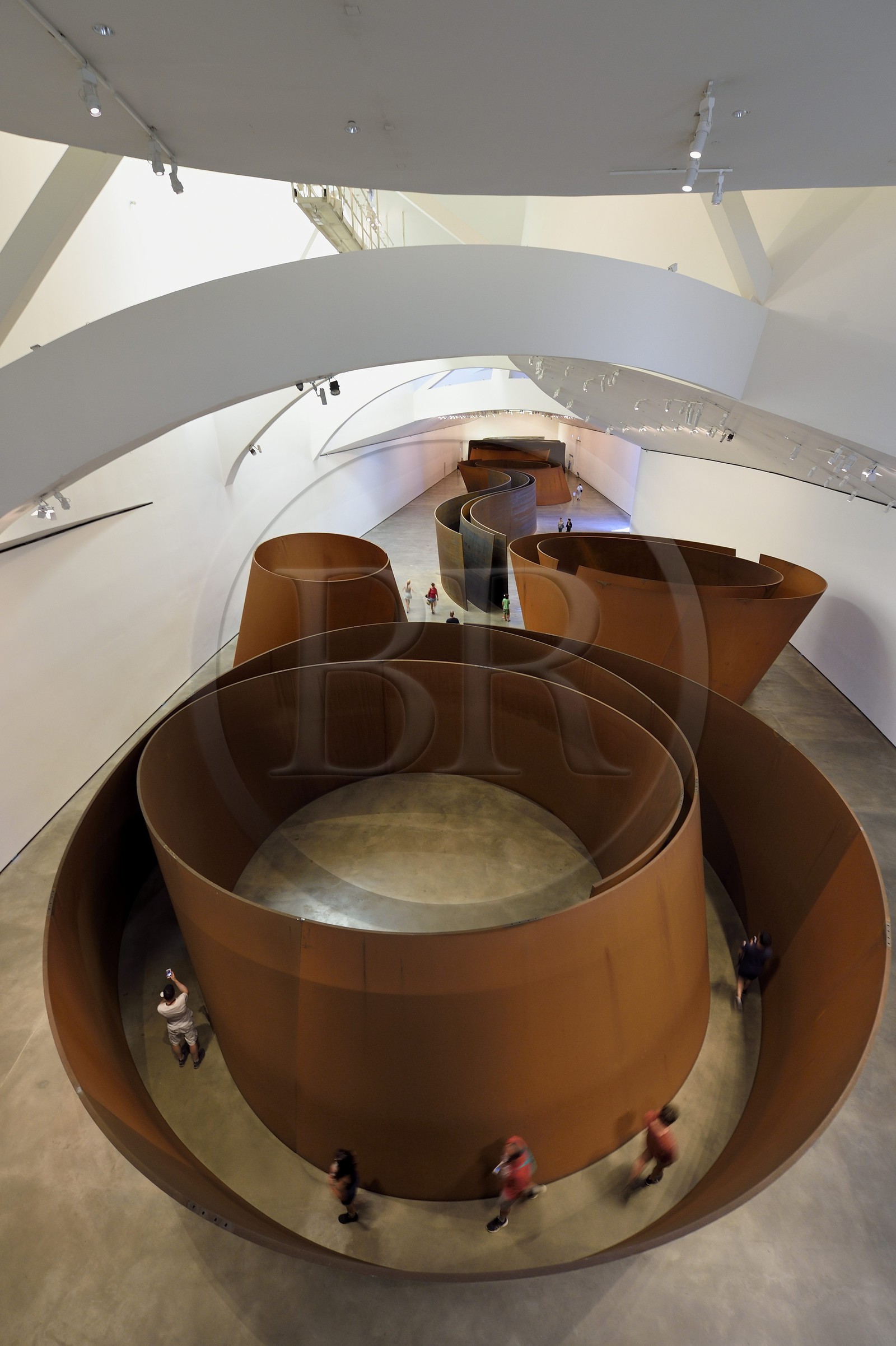 Spain, Basque Country, Biscay Province, Bilbao, the Guggenheim Museum designed by Frank Gehry, The Matter of Time, 1994-2005, eight steel sculptures patinable by Richard Serra