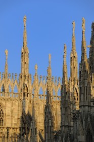 Italy, Lombardy, Milan, the Duomo in the historical center, cathedral in Gothic Flamboyant style, spires topped by statues