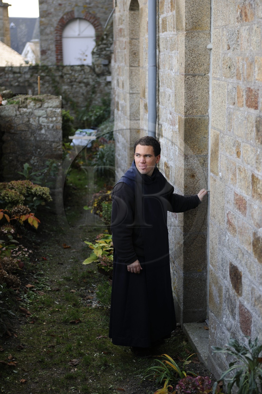 France, Manche, the abbey of Mont Saint Michel, listed as World Heritage by UNESCO, brother Sebastien, monk of Monastic Fraternities of Jerusalem