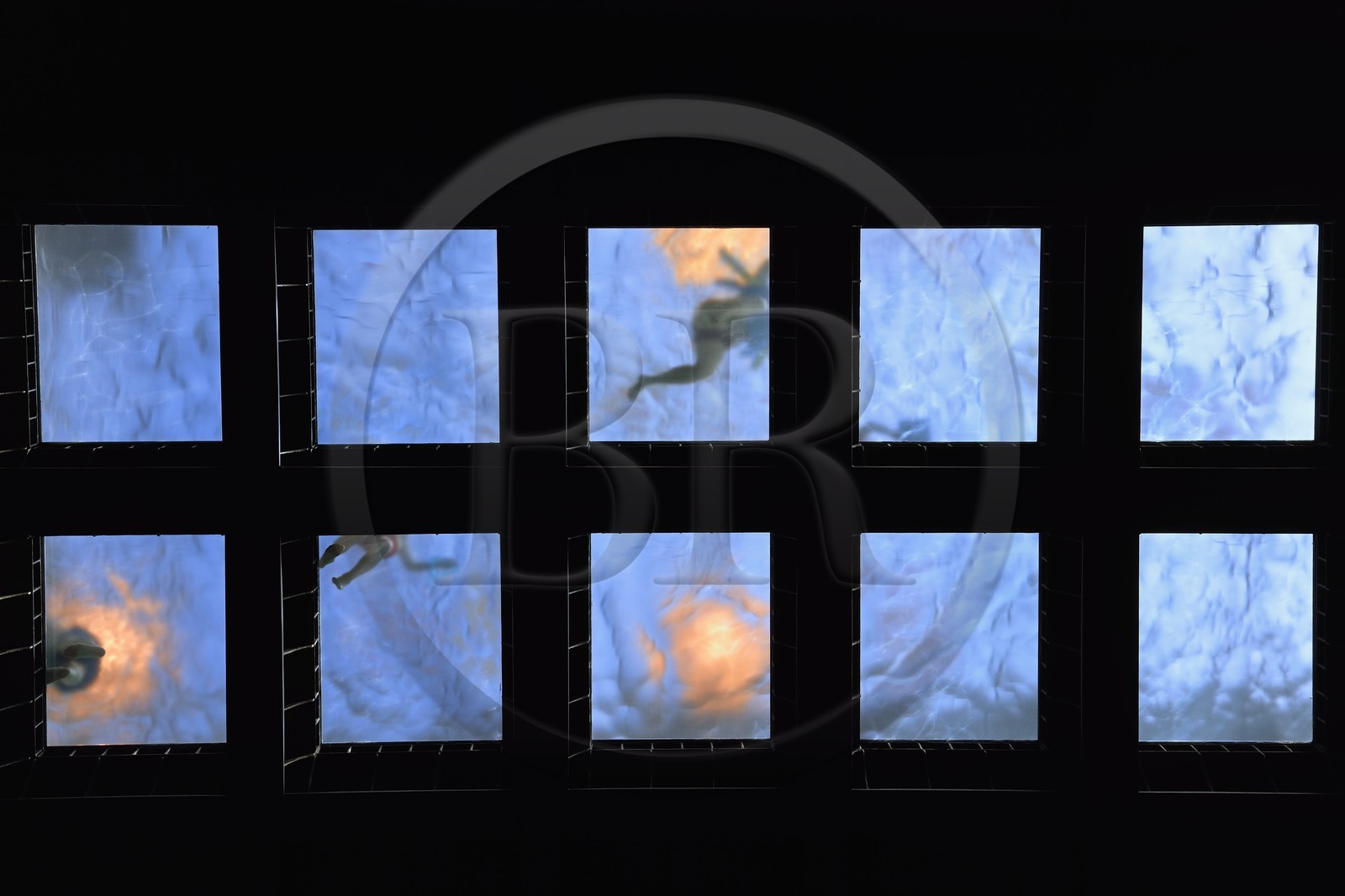 Spain, Basque Country, Biscay Province, Bilbao, Azkuna Zentroa, former municipal wine warehouse called Alhóndiga dating from 1909 completely restructured by Philippe Starck to host a cultural and leisure center, the pool seen from below