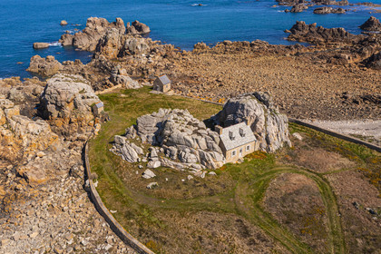 France, Cotes-d'Armor, Cote d'Ajoncs, Plougrescant, site of the Plougrescant Gouffre, the small house of Castel Meur, any representation for commercial use of this house is prohibited (aerial view)