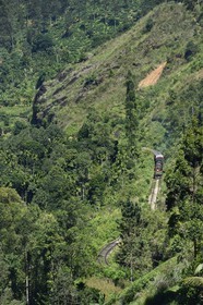 Sri Lanka, Uva Province, train on the railway track that goes through the tea growing hill country next to Ella (Badulla district)