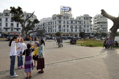 Morocco, Casablanca, United Nations square (place des Nations-Unies), Art Deco buildings and girls games