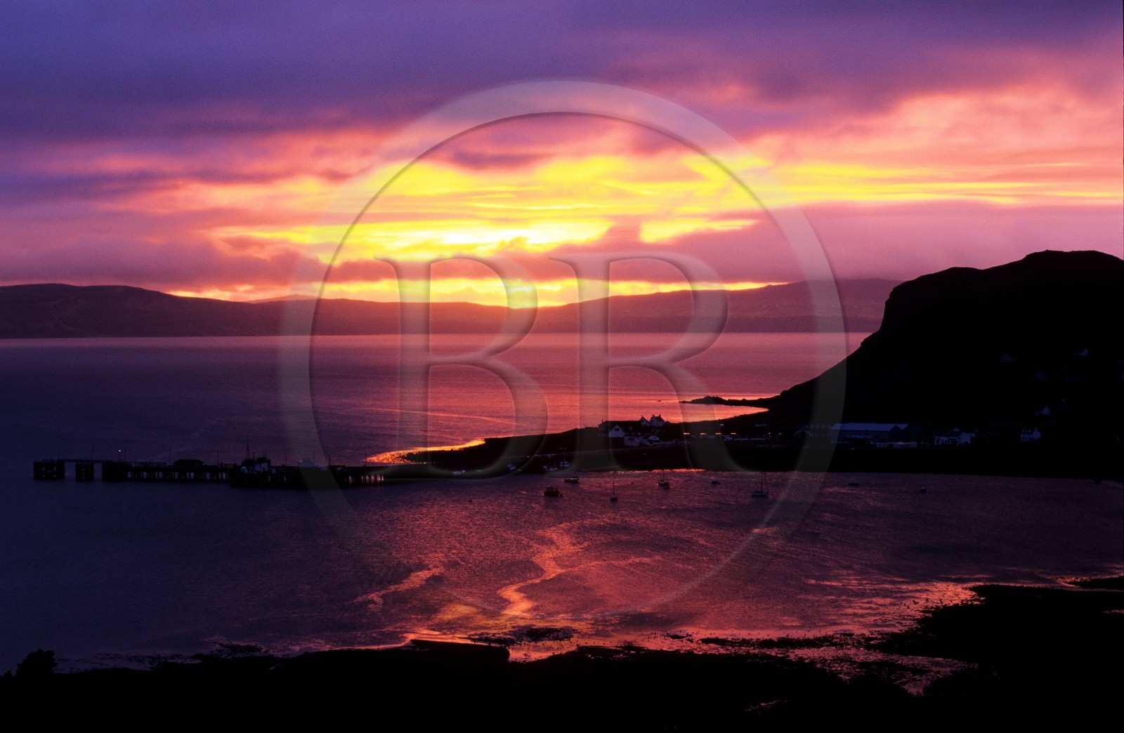 United Kingdom, Scotland, the Highlands, the Hebrides, Skye island, Bay and port of Uig at sunset