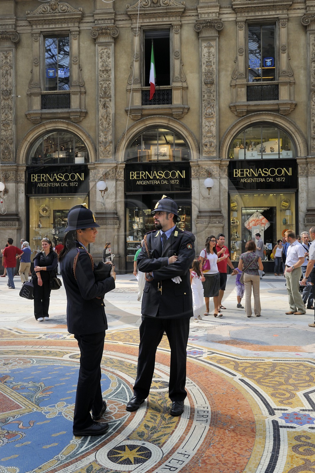 Italy, Lombardy, Milan, Vittorio Emmanuel II Gallery, shopping arcade built on the 19th century by Giuseppe Mengoni, police officers