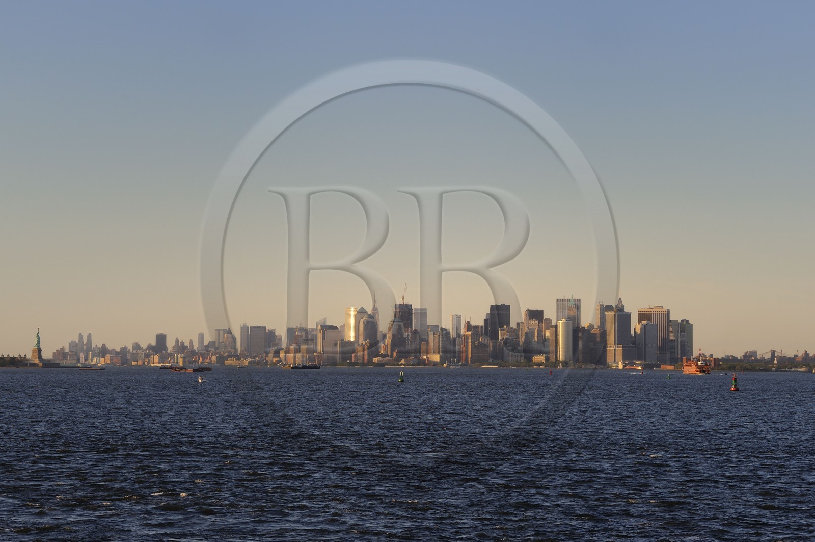 United States, New York, southern tip of Manhattan, Financial District buildings and Statue of Liberty