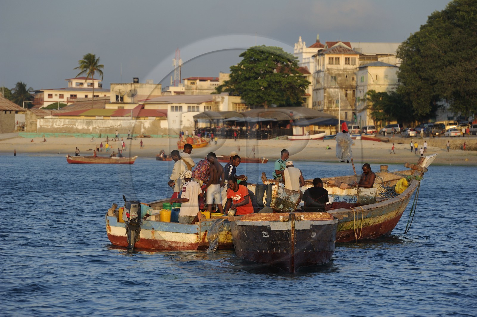 Tanzania, Zanzibar Archipelago, Unguja island (Zanzibar), Stone Town, listed as World Heritage by UNESCO, fishermen in front of the beach