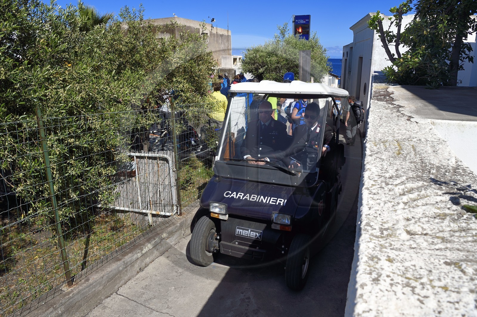 Italy, Sicily, Aeolian Islands, listed as World Heritage by UNESCO, Stromboli island, carabinieri patrol in an electric golf cart in the alleys of the village of Stromboli