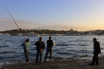 Turkey, Istanbul, the historic center classified World Heritage of UNESCO, Topkapi Palace and fishermen on the Bosphorus