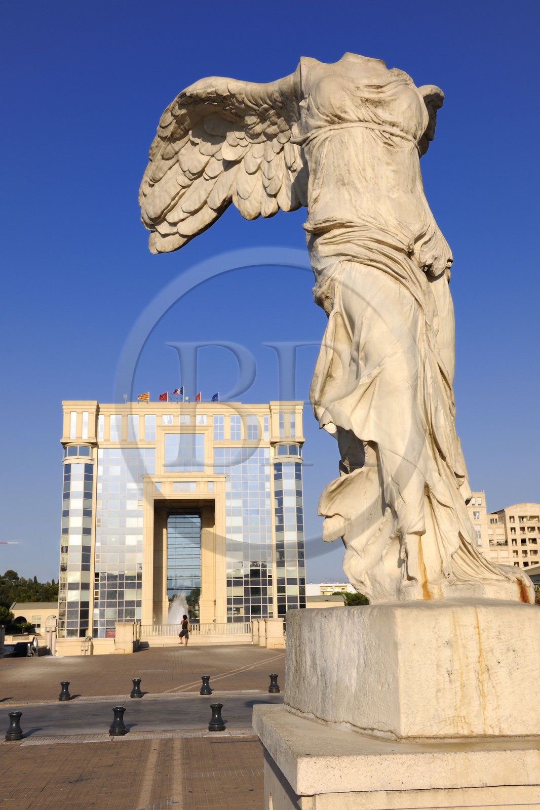 France, Herault, Montpellier, Antigone District, replica of the Winged Victory of Samothrace also called the Nike of Samothrace and Hotel de Region (Regional administration)