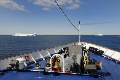 Greenland, Southern Region, cruise ship Princess Danae passing by icebergs of Farvel (Farewell) Cape