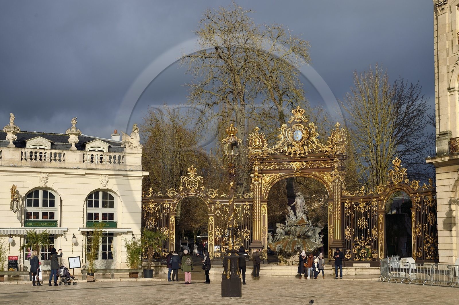 France, Meurthe-et-Moselle, Nancy, place Stanislas (former Place Royale) during the feast of Saint-Nicolas, listed as World Heritage by UNESCO, Amphitrite Fountain and golden gate by Jean Lamour
