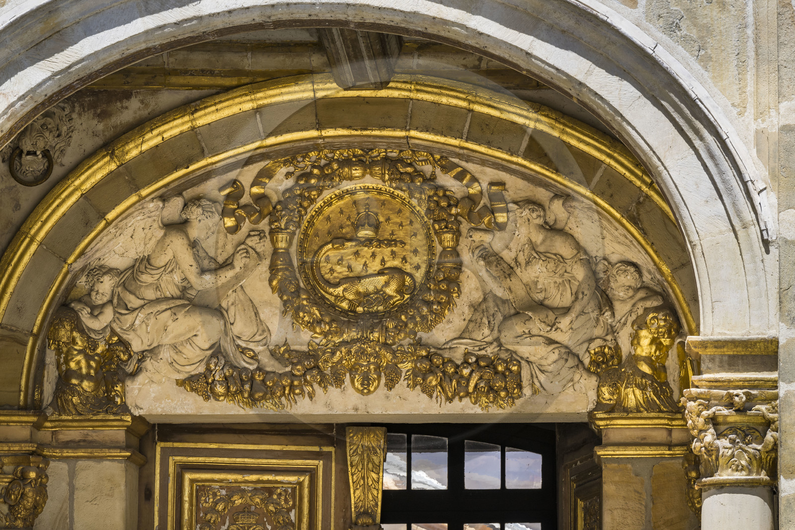 France, Seine-et-Marne, Fontainebleau, castle of Fontainebleau listed as World Heritage by UNESCO, the Golden Gate dating from 1528, the tympanum is decorated with the salamander of Francois I