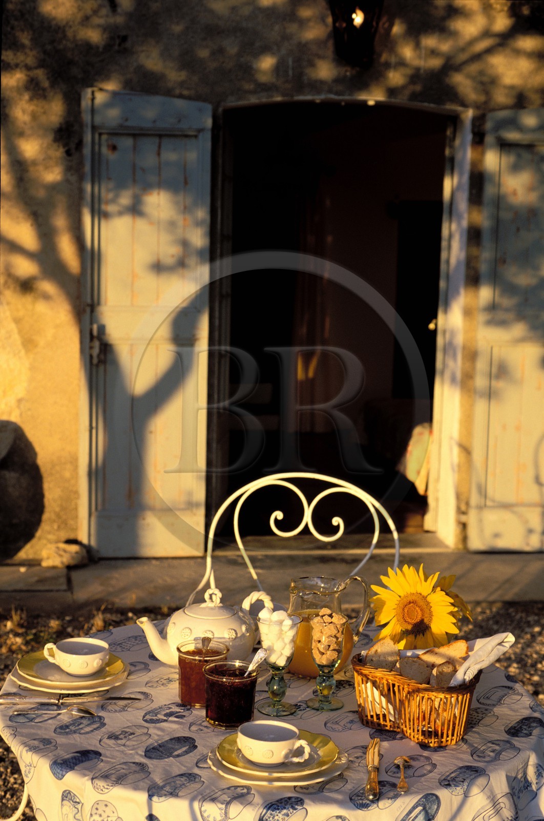 France, Gard, a table for breakfast in the Provencal bed and breakfast Le Mas de l' Amandier