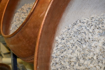 France, Meuse, Verdun, Braquier sugared almonds (dragee) factory, peeling almonds, operation designed to cover the almonds with a film and prevent oil from migrating to the outside
