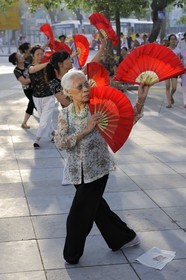 Vietnam, Hanoi, old town, Hoan Kiem Lake also called the small lake or Lake of the Restored Sword, people doing Tai chi