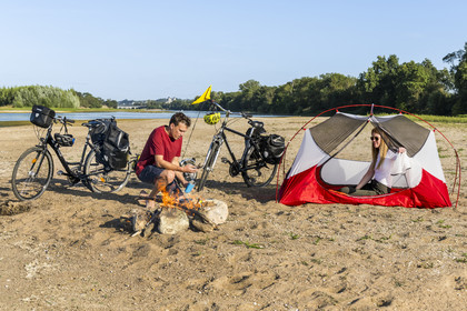 France, Maine-et-Loire, Loire valley listed as World Heritage by UNESCO, Saumur towards Saint-Hilaire, cycling along the banks of the Loire, setting up camp for the night on one of the sandbanks forming islands on the Loire