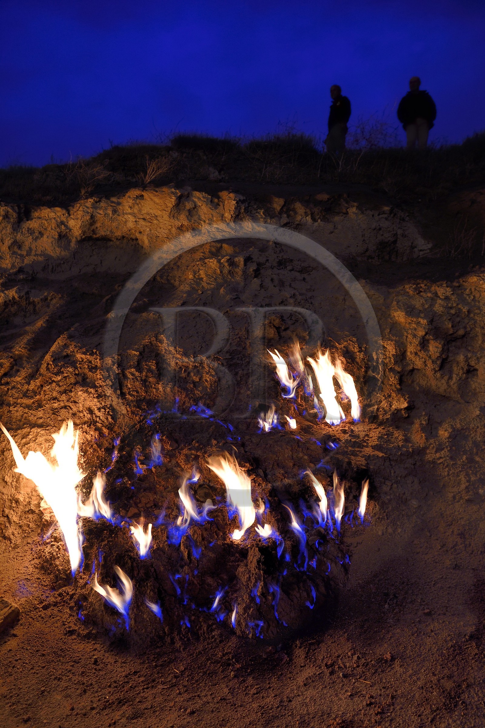 Azerbaijan, Baku, Absheron Peninsula, Yanar Dag meaning burning mountain is a natural gas fire which blazes continuously on a hillside