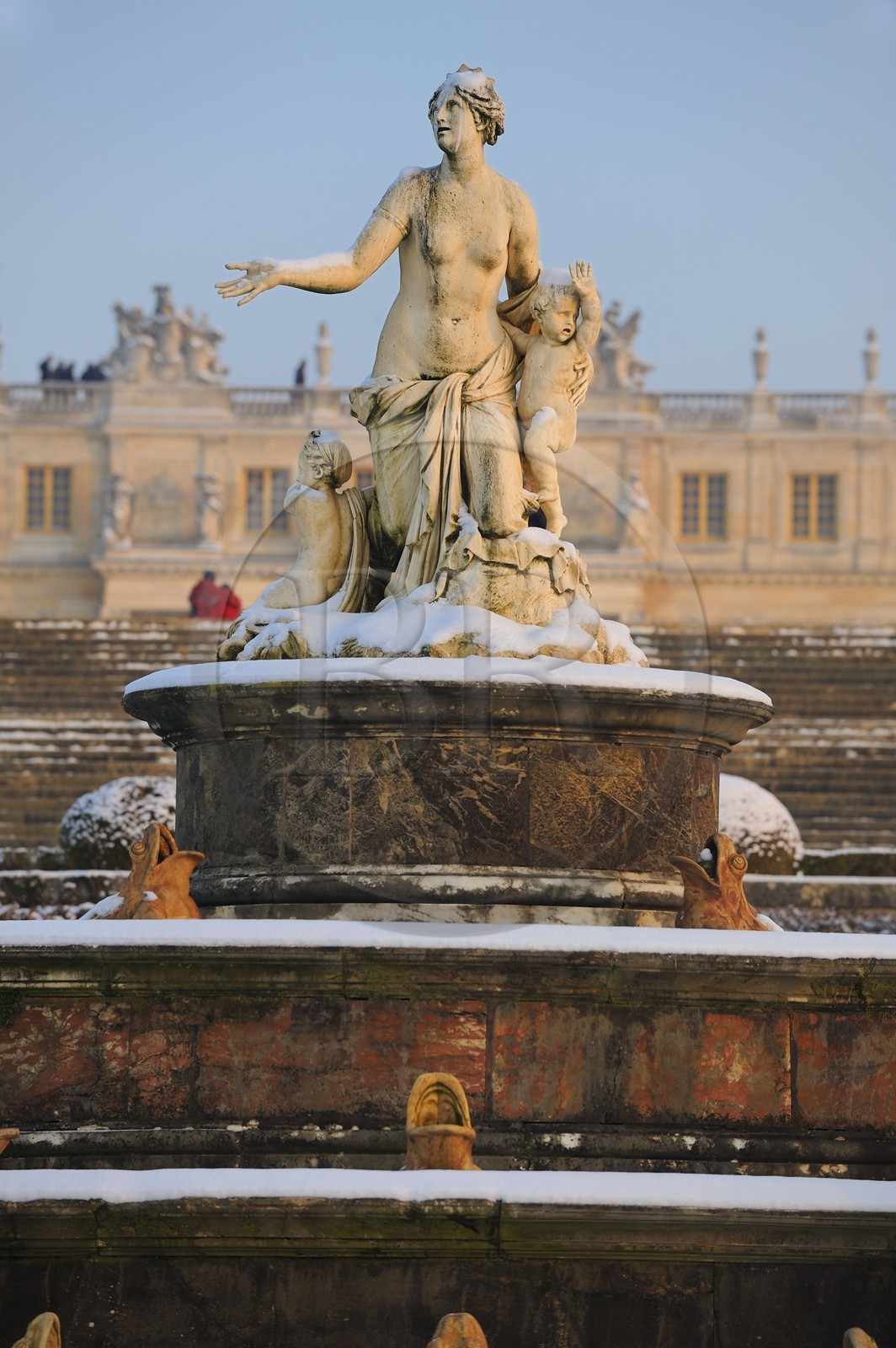 France, Yvelines, snow covered park of the Chateau de Versailles, listed as World Heritage by UNESCO, the Latona Basin