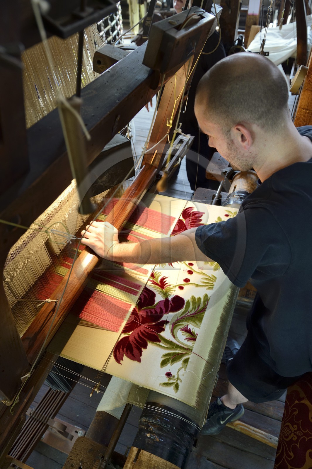France, Rhône (69), Lyon, quartier de la Croix-Rousse, Manufacture de soieries Prelle, métier à tisser la soie mis au point par Joseph Marie Jacquard dit métier Jacquard, le canut Sébastien