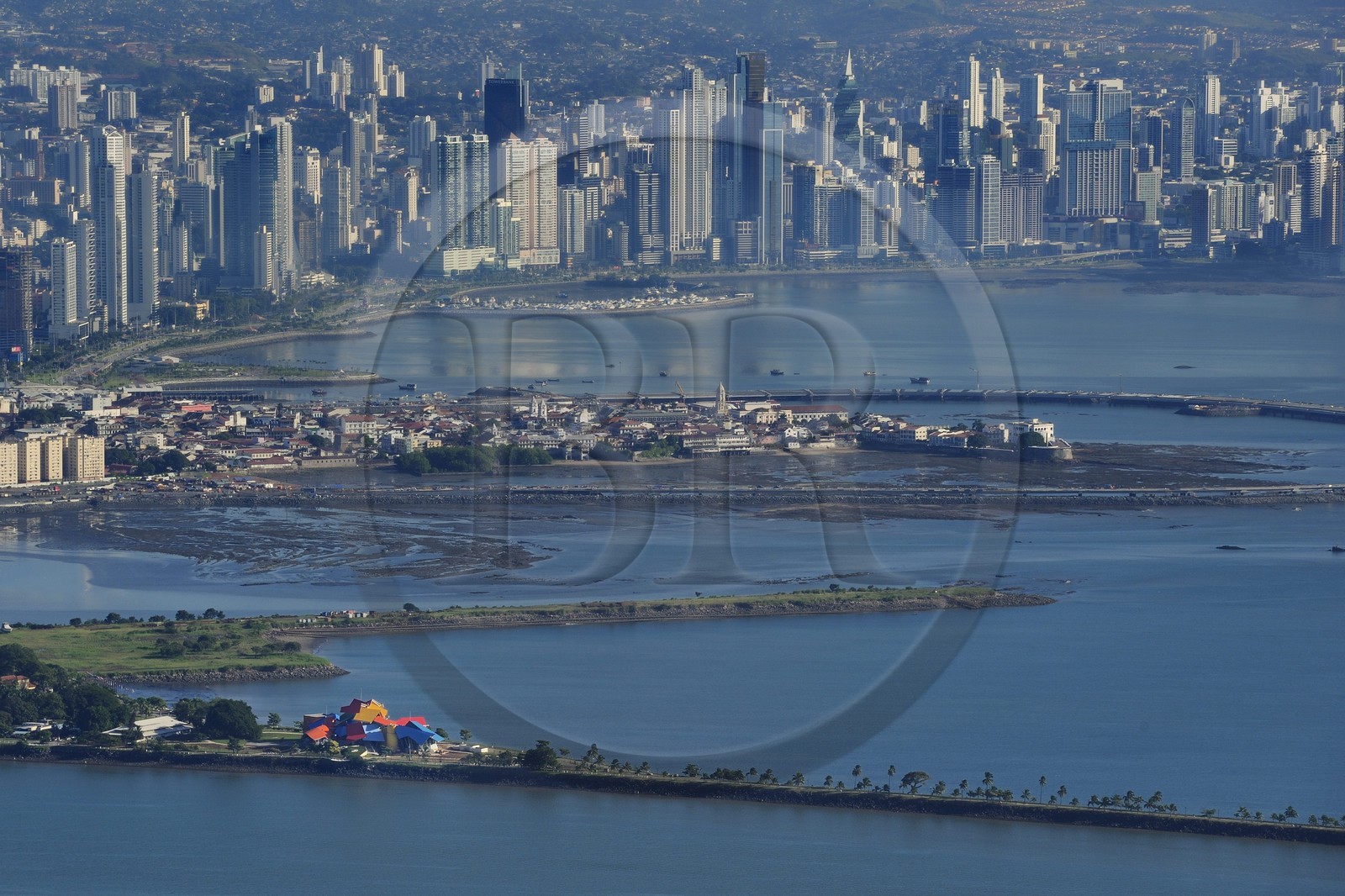 Panama, Panama City, the skyscrapers of the waterfront, the Biodiversity Museum named Panama Bridge of Life by architect Frank Gehry and the old town of Casco Antiguo (Viejo) in the foreground (aerial view)