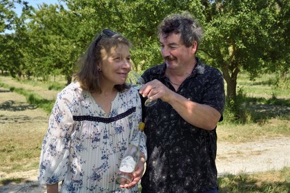 France, Meuse, Lorraine Regional Park, Cotes de Meuse, Combres sous les cotes, Domaine de Muzy, Véronique and Jean-Marc Liénard present their bottle of mirabelle plum brandy