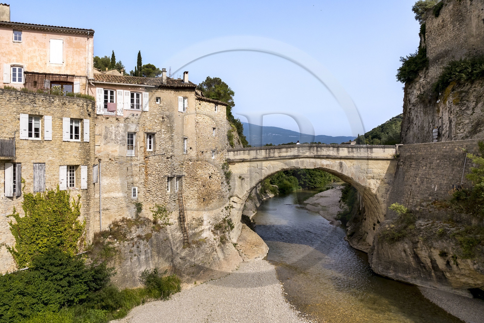 France, Vaucluse, Vaison la Romaine, the Roman bridge over the Ouvèze river dating from the 1st century AD which links the lower town and the medieval town (aerial view)