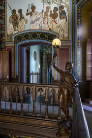 France, Pyrenees Atlantiques, Basque Country coast, Hendaye, Abbadia castle built in 1870 by Eugène Viollet-le-Duc for Antoine d'Abbadie d'Arrast, the grand staircase, torchiere lamp statue representing Abdullah former Ethiopian slave freed and dead under the commune of Paris