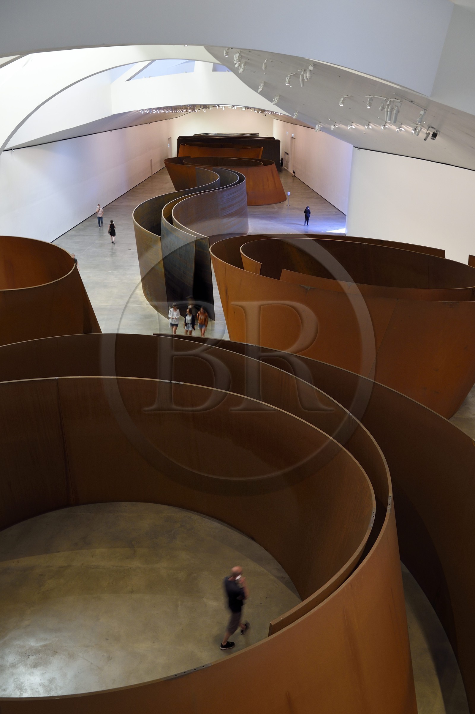 Spain, Basque Country, Biscay Province, Bilbao, the Guggenheim Museum designed by Frank Gehry, The Matter of Time, 1994-2005, eight steel sculptures patinable by Richard Serra