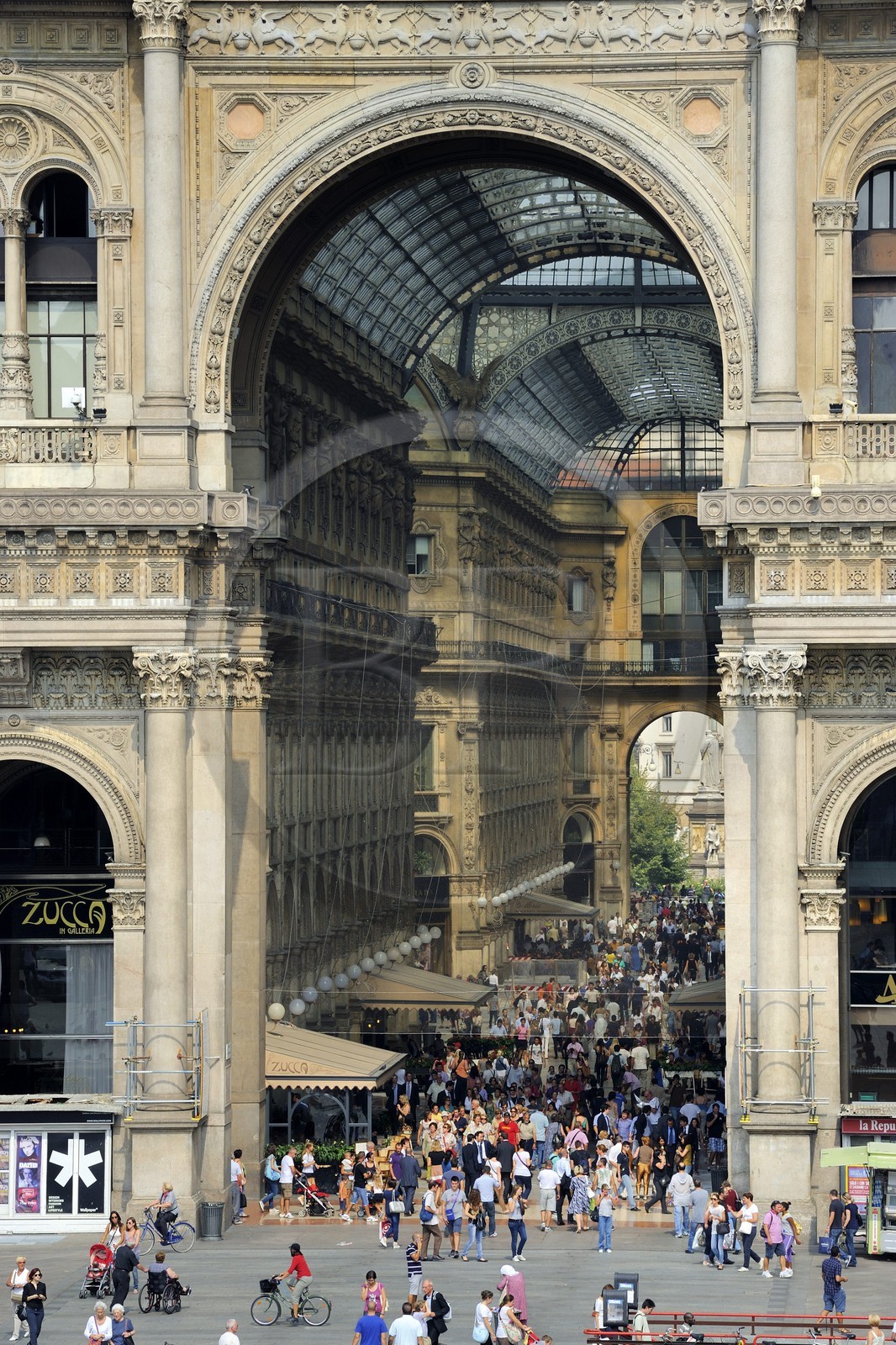 Italy, Lombardy, Milan, Piazza del Duomo, the entry of Vittorio Emmanuel II gallery, shopping arcade built on the 19th century by Giuseppe Mengoni