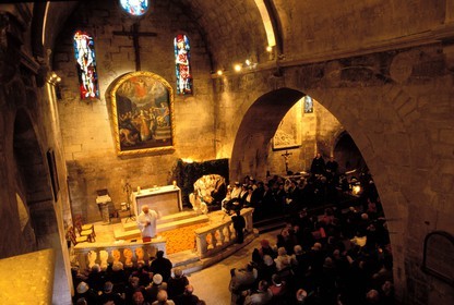 France, Bouches du Rhone, Les Baux de Provence village, labelled Les Plus Beaux Villages de France (The Most Beautiful Villages of France), Christmas celebrations, midnight mess at Saint Vincent church